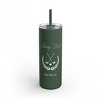 Green tumbler with a straw featuring a golf-themed design on a white background